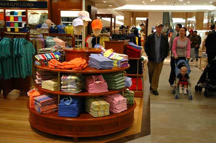Shoppers stroll the aisles in Dillard's